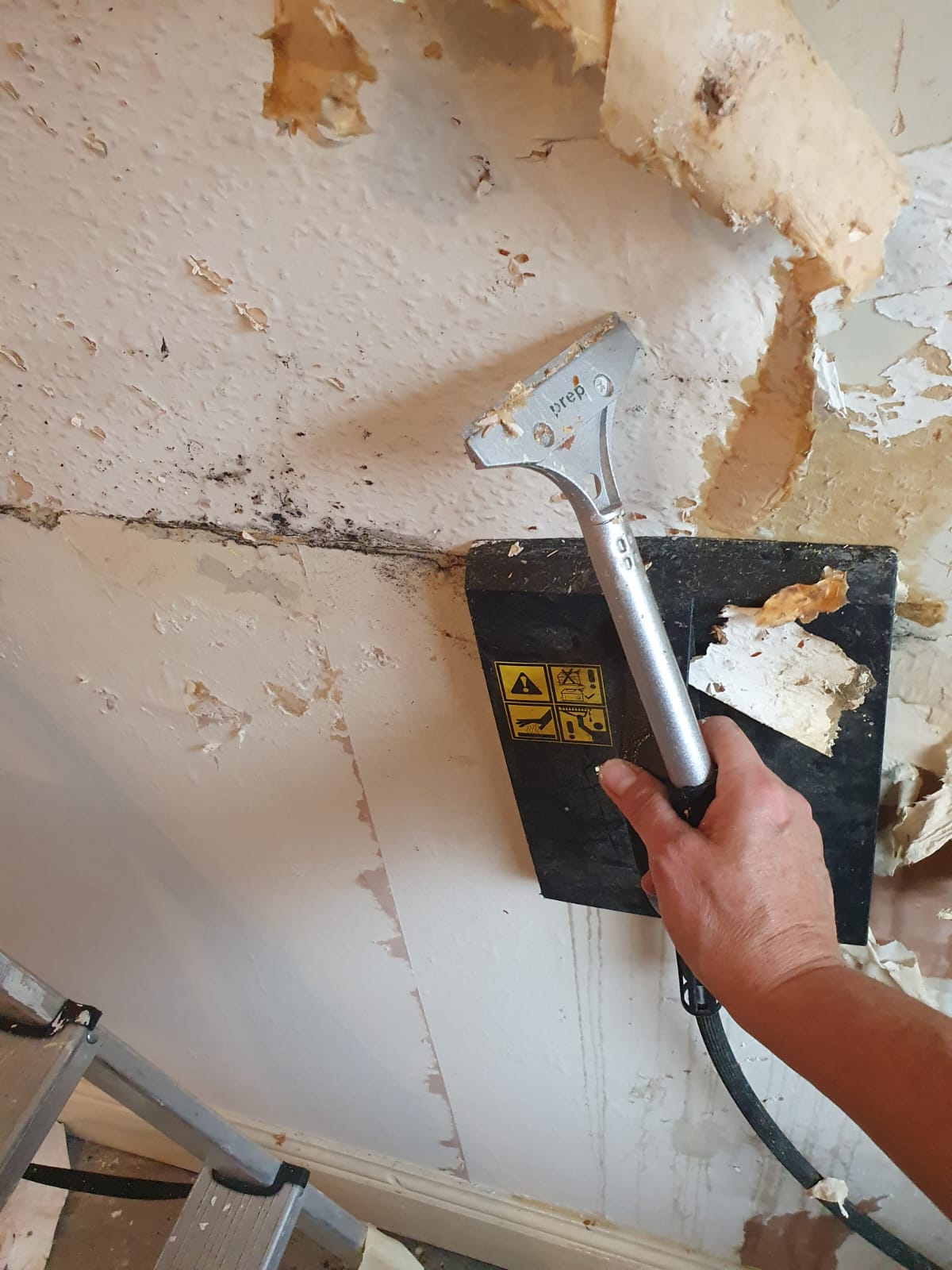 stripping off the walls, walls are getting prepared for plastering and painting by Bright Star Cleaning and Maintenance Services