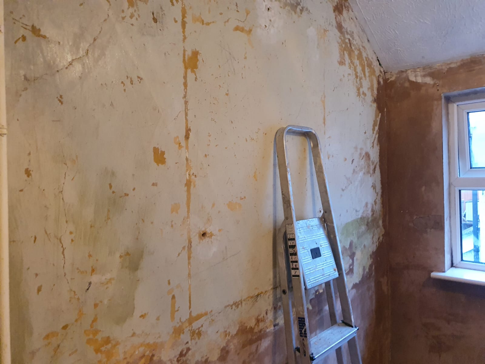 Plastering and painting of a run down house by Bright Star Cleaning and Maintenance Services